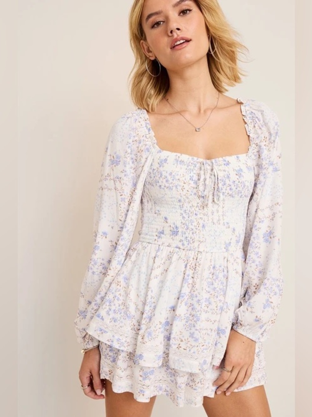 Francesca’s Blue & White Floral Smocked Long Sleeve Romper Size Large